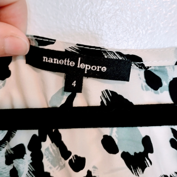 Nanette Lepore silk leopard print top with large bow. Size 4. Small stain shown - Picture 3 of 6